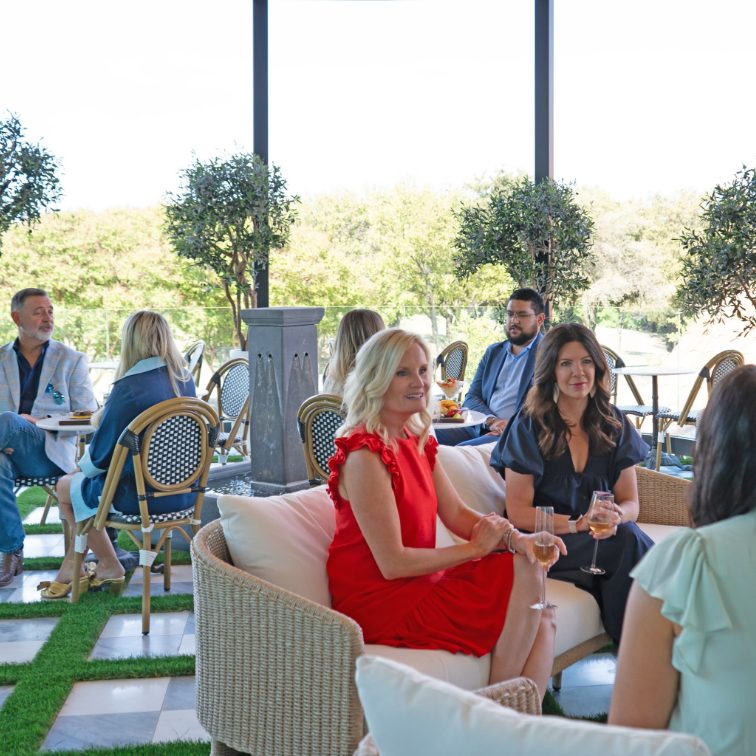 members socializing on patio terrace